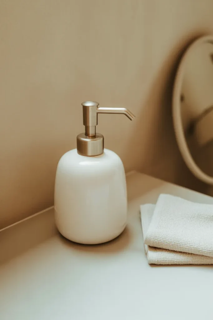 Minimalist Soap Dispensers with Gold Accents